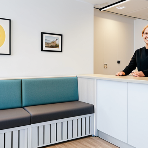 Home 22 Rehab Clinic Reception**
"A brightly lit, modern reception area of a rehabilitation clinic in Stockholm. Soft, calming colors, comfortable seating, and friendly staff at the front desk. A patient is being greeted with a warm smile. Safe for work, appropriate content, fully clothed, professional, family-friendly, perfect anatomy, correct proportions, natural pose, well-formed hands, proper finger count, natural body proportions, high quality."
**